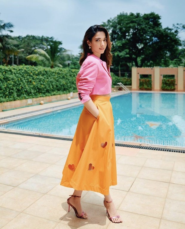 Tamannaah Bhatia nails colour blocking trend, makes statement in pink crop top and tangerine skirt worth Rs. 35K 