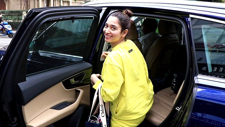 Tamannaah Bhatia waves at paps in matching yellow outfit - Bollywood ...