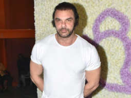 Sohail Khan poses for paps in black tshirt and denims
