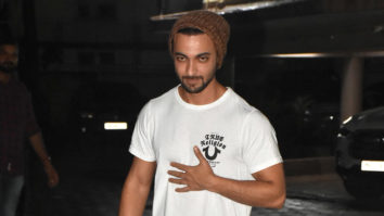 Aayush Sharma smiles for paps in white tshirt and beanie
