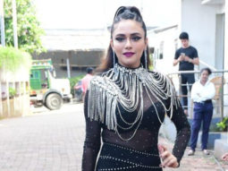 Amruta Khanvilkar poses in a black bold outfit
