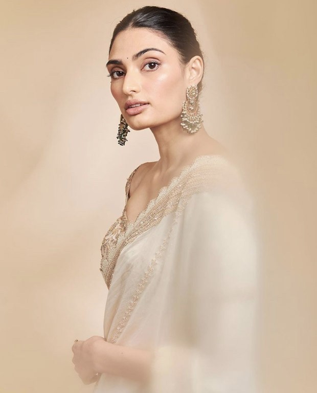 Athiya Shetty goes all traditional in an ivory and golden saree by Anamika Khanna in latest photo-shoot