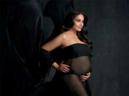 Bipasha Basu cradles bare baby bump in a sheer black gown; shares stunning images from her maternity shoot