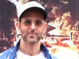 Fans chant Hrithik as she poses in blue polka dot shirt