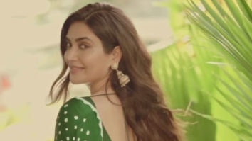 Karishma Tanna looks beautiful in green saree and jhumkas
