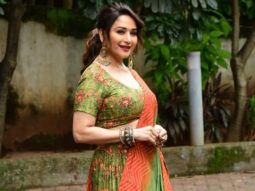 Madhuri Dixit poses in green lehenga and heavy earrings