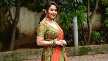 Madhuri Dixit poses in green lehenga and heavy earrings