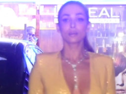 Malaika Arora poses for paps in a yellow glittery outfit