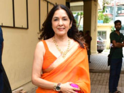 Neena Gupta looks flawless in orange saree as she smiles for paps
