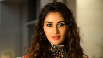 Nikita Dutta looks beautiful in a red bridal lehenga