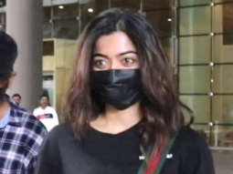 Rashmika Mandanna smiles for a selfie with fans