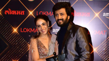 Riteish Deshmukh and Genelia D’souza walk hand in hand at the Lokmat Awards
