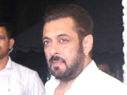 Salman Khan poses for paps in a white shirt