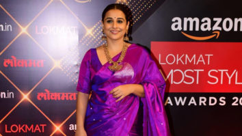 Vidya Balan looks royal in purple saree and a flowery bun