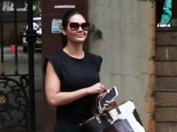 Esha Gupta smiles for paps in black outfit