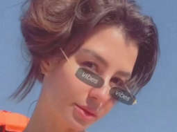 Giorgia Andriani enjoys the sunny weather by the beach