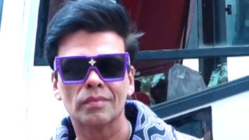 Karan Johar slays in a funky purple jacket with Amruta Khanvilkar at Jhalak Dikhhla Jaa sets