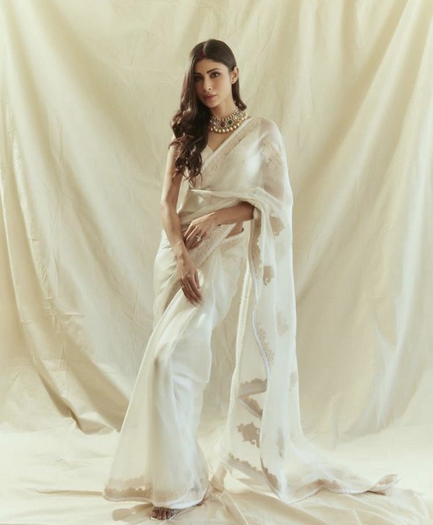 Mouni Roy looks enchanting in a dazzling white saree for Durga Ashtami celebrations