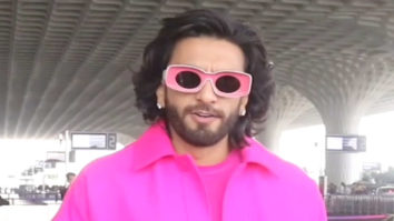 Ranveer Singh look like a flash of bright pink as he poses for paps at airport