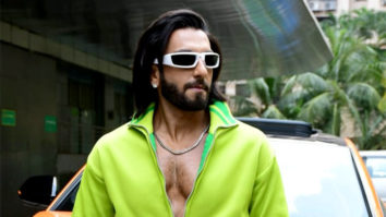 Ranveer Singh poses with his swanky orange car