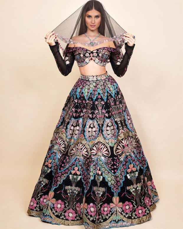 Tara Sutaria brings demure touch to Lakme Fashion Week in Aisha Rao’s festive embellished lehenga, off-shoulder choli and a veil