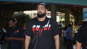 Badshah greets paps at the airport sporting a black outfit