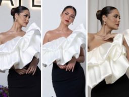 Esha Gupta is a vision to behold in black-and-white ruffled dress as she attends an event in Doha