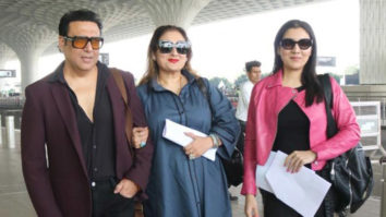 Govinda & his wife Sunita Ahuja pose for paps at the airport