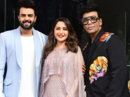 Karan Johar, Madhuri Dixit and Maniesh Paul smile for paps