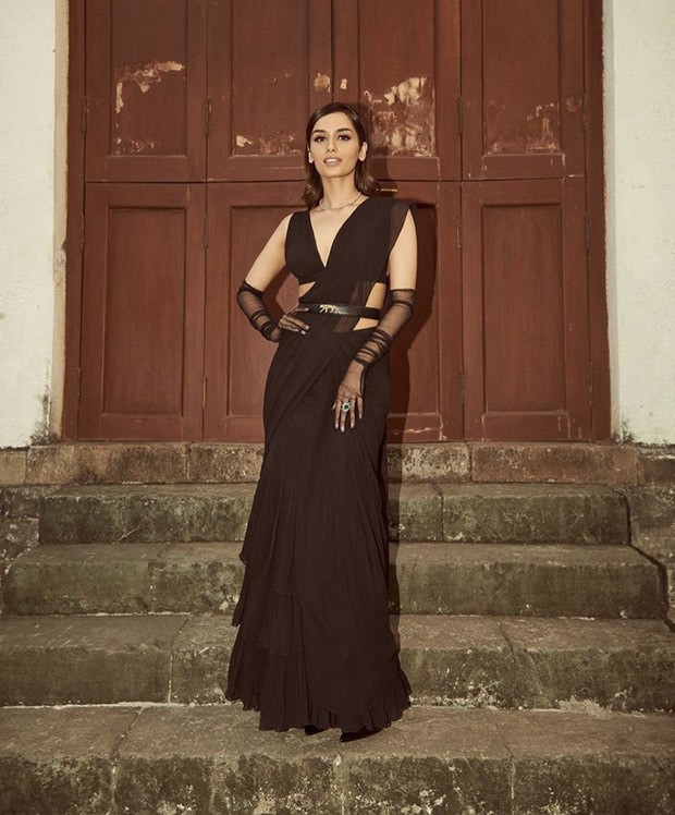 Manushi Chhillar leaves us spellbound in her regal black saree look as she attends India’s first-ever Forces of Fashion event