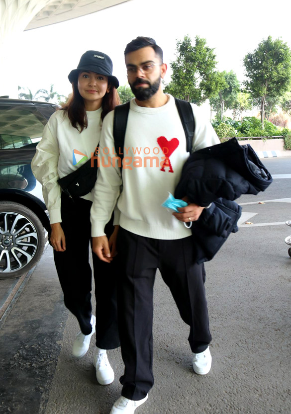 photos anushka sharma virat kohli poonam pandey and anupam kher snapped at the airport 6