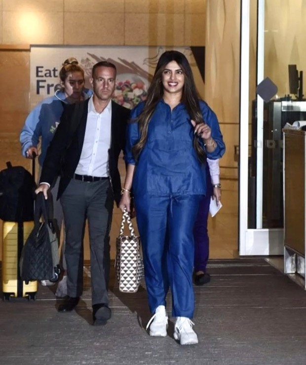 Priyanka Chopra sports denim on denim comfy look as she gets mobbed at Mumbai airport; binges on Koffee with Karan to beat jet lag Priyanka Chopra sports denim on denim comfy look as she gets mobbed at Mumbai airport; binges on Koffee with Karan to beat jet lag