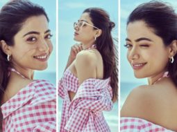 Rashmika Mandanna is a breath of fresh air as she poses at the beach wearing a sweet pink chequered cut-out dress