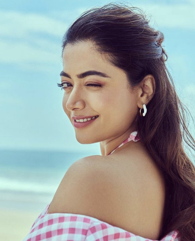 Rashmika Mandanna is a breath of fresh air as she poses at the beach wearing a sweet pink chequered cut-out dress