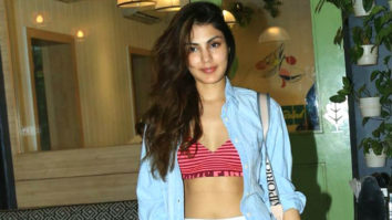 Rhea Chakraborty poses for paps outside a cafe