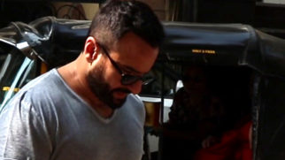 Saif Ali Khan gets clicked with Taimur outside their house