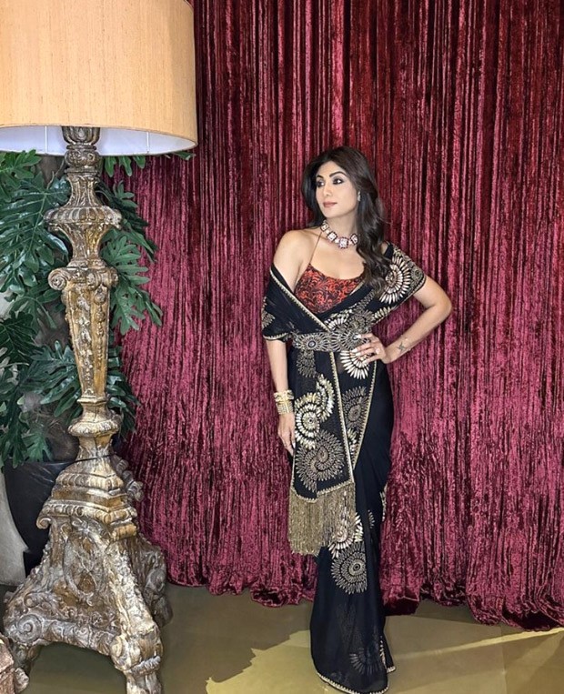 Shilpa Shetty is a sight to behold in an Anand Kabra black & gold saree worth Rs. 91