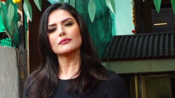 Zareen Khan poses for paps in black tshirt and denims