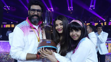 Abhishek Bachchan pulls Aishwarya Rai Bachchan into a tight hug after he bags the trophy for Pro Kabaddi League