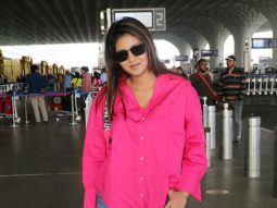 Anjali Arora gets snapped in a bright pink shirt as she poses for paps