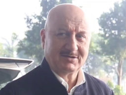 Anupam Kher greets his fans & paps on the airport