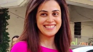Genelia D’souza gets clicked in a bright pink tshirt as she smiles for paps