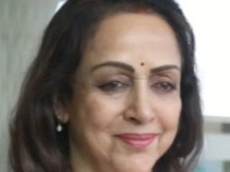 Hema Malini greets paps at the airport