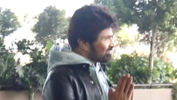Himesh Reshammiya poses with wife as he gets clicked at the airport