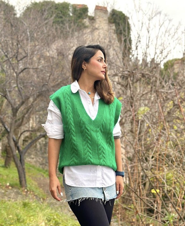 Hina Khan gives winter fashion cues in a bright green sweater vest and denim skirt while being on vacation in Turkey