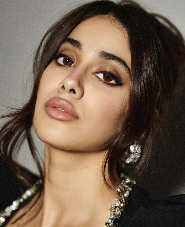 Janhvi Kapoor is extending "season's greetings" to everyone while donning a black bodycon dress with sparkling accents