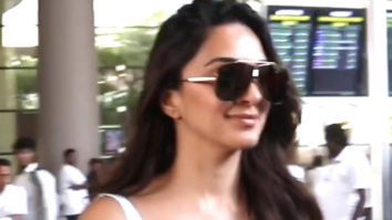 Kiara Advani smiles for a selfie with a fan at the airport