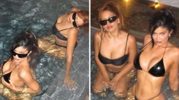 Kylie Jenner lounges with a friend in a hot tub at midnight while donning a tiny black bikini in Aspen’s frigid weather