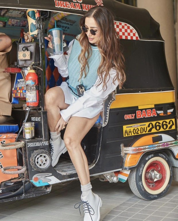Malaika Arora proves again that she is the queen of fashion with a mini shirtdress and a sweater vest
