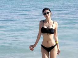 Mouni Roy sports a chic black bikini on a sunny day at beach as she is set to ring in 2023 in Dubai